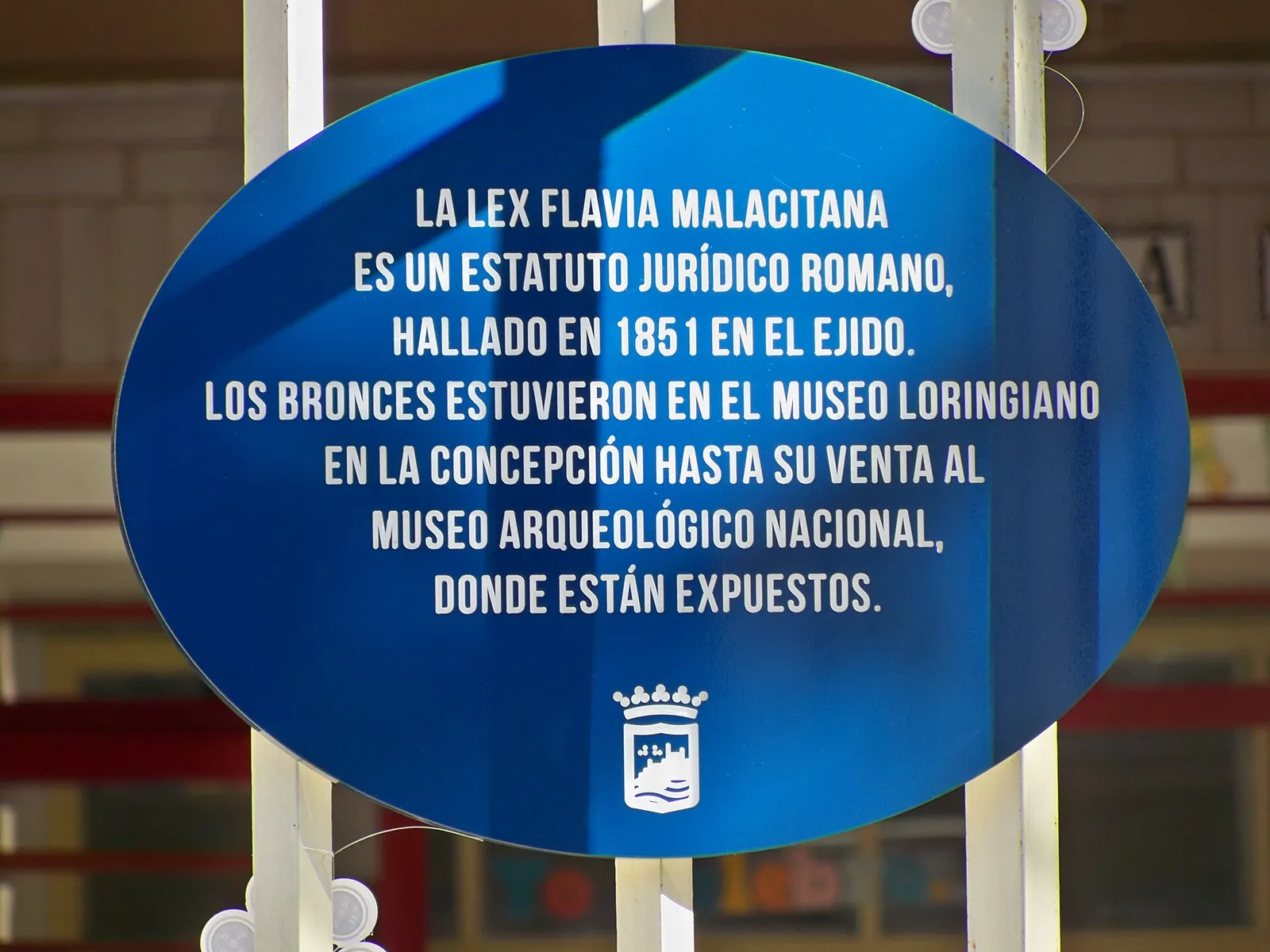 Placa a la Lex Flavia Malacitana