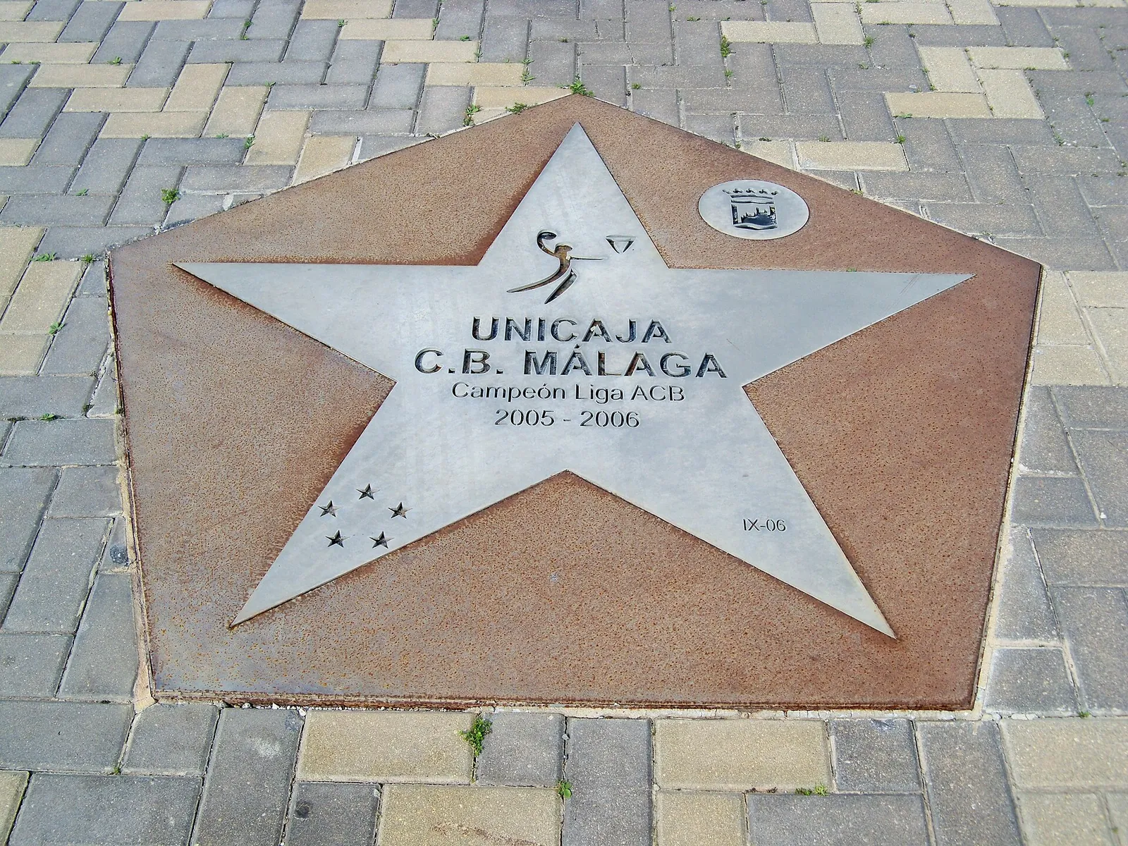 Placa al Unicaja C. B. Málaga